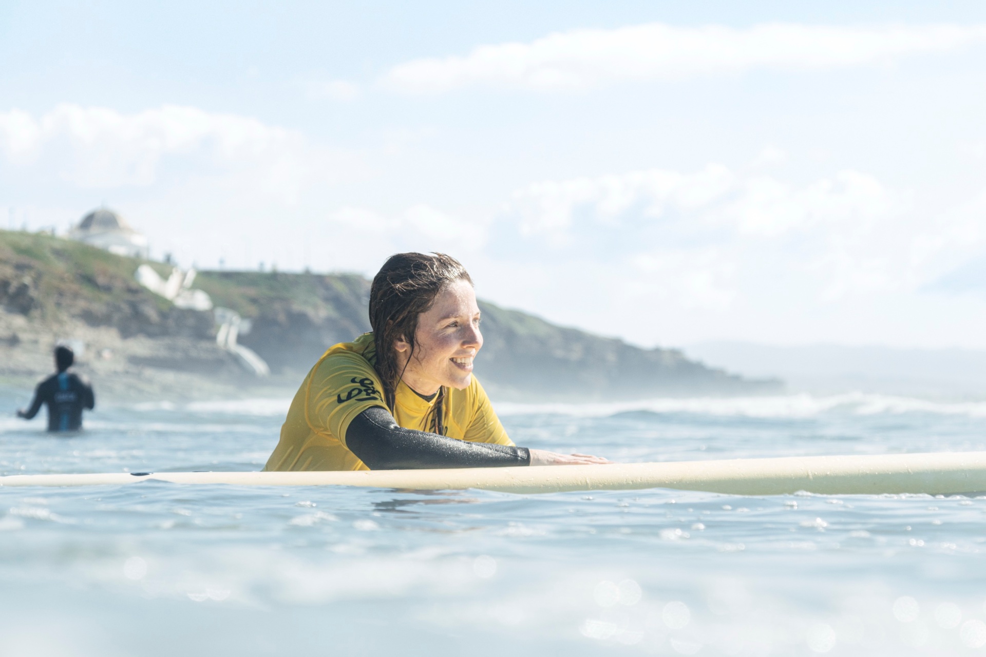 Surfer in the water near Ericeira
